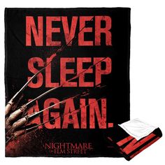 a blanket with the words never sleep again on it