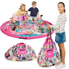 two children are playing with toys on a play mat and bag set up in the shape of a boat