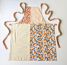 an apron made out of two different fabrics