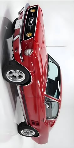 a red sports car is shown from above