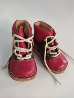 "Cozy Low boots in burgundy and brown with lining! Adorable treasure from the past.  French vintage 80/90's, cute sturdy bicolor shoes from 100% leathernatural leather, synthetic lining and cream colour laces, rubber sole. Condition the boots is corresponds to an almost new vintage condition. Any defects are systematically reported. Even though in very good condition, vintage items may present imperfections due to their age, which mainly adds to their charm :) For the vintage design of your room Vintage Leather Booties, Brown Boots With Soft Sole For Fall, Brown Boots With Soft Sole And Round Toe, Brown Soft Sole Boots For Fall, Brown Soft Sole Round Toe Boots, Brown Round Toe Boots With Soft Sole, High-top Leather Boots With Soft Sole, Vintage Leather Closed Toe Booties, Retro Brown Closed Toe Boots