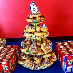 a christmas tree made out of doughnuts on a table