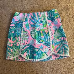 Lilly Pulitzer Skort Patty Skort Cute Fitted Bottoms For Vacation, Pink Beach Bottoms With Pockets, Pink Bottoms With Pockets For Beach Season, Cute Pink Bottoms For Vacation, Cute Pink Floral Print Bottoms, Womens Skorts, Skort Romper, Wrap Skort, Size 12 Women