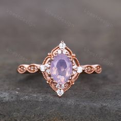 Handmade with natural lavender amethyst - a unique pale purple gemstone, and adorned with sparkly simulated diamonds, this gorgeous ring is meticulously crafted. This is a Vintage Engagement ring with Lavender Amethyst and Cubic Zircon. This ring is marked S925/G10K/G14K Main stone is 5x7mm Oval Cut Natural Lavender Amethyst, side stones are cubic zirconia. Best Gift for Engagement,wedding,birthday gift. I accept custom making order.Please contact me if you need this service. All the jewelry in Rose Gold Emerald Ring, February Birthstone Ring, Amethyst Engagement Ring, Vintage Lavender, Lavender Amethyst, Amethyst Ring Engagement, Ring Rosegold, Emerald Ring Gold, Opal Wedding Rings