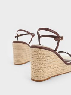 A summertime classic for good reason, these espadrille wedges are a must-add to your style rotation. In a dark brown colourway that is just as versatile as black, these shoes will slot into your neutral outfits with ease. This pair also offers an impressive 9.5cm elevation for a height boost that does not compromise on comfort. Bonus points for the adjustable ankle straps that guarantee an extra secure fit. Brown Espadrilles, Neutral Outfits, Brown Wedges, Charles Keith, Neutral Outfit, Ankle Straps, Espadrilles Wedges, Dark Brown, Espadrilles