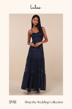 a woman in a long blue dress with the words shop the wedding collection on it