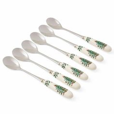 six spoons with christmas trees on them