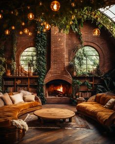 a living room filled with furniture and a fire place in the middle of a room