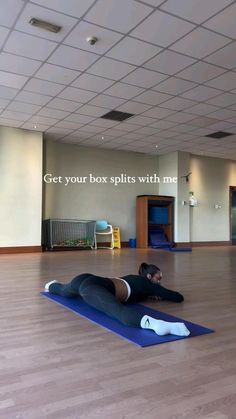 two people laying on yoga mats in an empty room with the words get your box splits with me