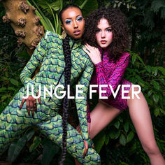 two women in bodysuits posing next to each other with jungle fever written on them