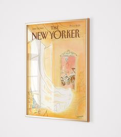 the new yorker magazine is hanging on the wall