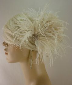 "Bridal Fascinator, Feather Fascinator, Ivory Fascinator, Wedding Fascinator, Ivory Hair Clip,Fascinator, 1920s Headpiece, Roaring 20s, Gatsby Headpiece, Bridal Headpiece, Wedding Headpiece, Wedding Veil, icegreeneyes What one bride had to say about this set. \"Arrived home to find a little brown box. Inside was the beautiful feather hair piece and veil. I cannot wait to wear this next weekend for my wedding. I can see all the time and care that went into this piece.\" ~ Off White ostrich plumes Wedding Hair Fascinator, Feather Hair Pieces, Ivory Fascinator, 1920s Headpiece, Nola Wedding, Fascinator Wedding, Bridal Fascinator, Fascinator Hairstyles, Feather Fascinator