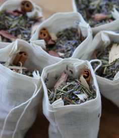 several bags filled with different types of herbs