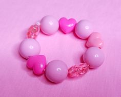 So cute and fun! Great for your Valentine's Day coords or kandi bracelet collection!💖 MATERIALS: Mint green lucite beads with pastel bow beads, on thick pink elastic cord. 💖 SIZE: Bracelet: About 7" around.💖 CARE INSTRUCTIONS: Store in cool, dry place.💖 PROCESSING TIME: 1-2 days for shipping.💖 SHIPPING: 2-5 business days within the US via USPS First Class Mail. 7-22 business days international via USPS First Class International mail. Bow Beads, Pastel Bows, Kandi Bracelets, Loving Your Body, Bracelet Collection, Bubblegum Pink, Heart Beads, Bubble Gum, Mint Green