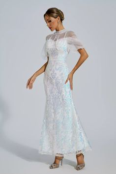 As a product expert, I am pleased to introduce the Selina Maxi Dress - perfect for any special event. This stunning dress features evening dresses, gala ballgowns, and a sparkling sequin design that will surely make you stand out. With its elegant and versatile design, it's the perfect choice for cocktail parties, graduation, and other formal occasions. Feel confident and stylish in this must-have dress. Material: Polyester Mermaid Dress With Sweep Train For Prom Gala, Gala Prom Mermaid Dress With Fitted Bodice, Floor-length Mermaid Dress For Prom, Elegant Sparkling Tulle Gown, Sequin Tulle Ball Gown For Gala, Glamorous Ball Gown With Fitted Bodice For Banquet, Sparkling Tulle Evening Dress For Gala, Glamorous Mermaid Dress For Wedding Gala, Glamorous Mermaid Dress For Wedding And Gala