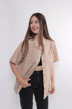 Hi! Welcome to TARASCOMMON.ETSY.COM, your destination for unique clothing from the 20th century! This listing includes a 90s plaid print short sleeve button up blouse in multicolor design. This top is perfect for adding a touch of retro charm to your wardrobe. Key Features: 90s funky retro button up top Vintage style plaid blouse Size: LARGE. Measurements (taken seam to seam while lying flat): Sleeve: 12cm / 4.72inch (armpit to end of sleeve) Width: 63cm / 24.8inch Length: 68cm / 26.77inch Mater Plaid Short Sleeve Summer Blouse, Summer Plaid Short Sleeve Blouse, Summer Plaid Blouse With Short Sleeves, Summer Plaid Relaxed Fit Blouse, Summer Plaid Blouse With Relaxed Fit, Plaid Short Sleeve Top For Summer, Summer Plaid Collared Tops, Spring Plaid Short Sleeve Shirt, Plaid Collared Top For Summer