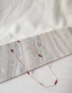 Elevate your style with this beautiful beaded chain necklace, handcrafted to add a touch of elegance to any outfit. This red quartz beaded necklace makes for a thoughtful and meaningful gift. Whether it's a birthday, anniversary, or a special occasion, it's a beautiful way to show your appreciation and affection for someone you care about. The necklace is made with high quality and hypoallergenic materials. 14K gold filled cable chain, 3mm red quartz gemstone beads and 2mm gold * PRODUCT DETAILS 14k Gold Filled Beaded Chain Necklace, Red Gemstone Beads Necklace, Dainty 14k Gold Filled Necklaces With Gemstone Beads, Elegant 14k Gold Filled Gemstone Beads Necklace, Elegant Handmade Beaded Necklace In 14k Gold Filled, Dainty 14k Gold Filled Necklace With Tiny Beads, Elegant Handmade 14k Gold Filled Beaded Necklaces, Gold Gemstone Beaded Necklace In 14k Gold Filled, Dainty 14k Gold Filled Gemstone Beads Necklace