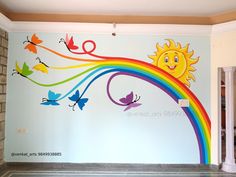 a wall painted with colorful butterflies and a sun on the top of it, next to a doorway