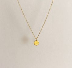 FREE SHIPPING, 14k yellow solid gold circle necklace. It can be produce 14k rose gold and white gold. DETAILS Chain is shown length approx. 40 cm (16 inch) and thickness is 1mm (0.04 inch). Circle height is 0.6 cm (0.23 inch). Chain can be lengthened for choosing option. The chain has a spring ring clasp. You may order a shorter or longer chain by leaving a note during checkout. MATERIALS All our jewelry are made of 14 karats solid gold. We like to use yellow gold, white gold and rose gold to pl Dainty Choker Necklace, Gold Circle Necklace, Karma Necklace, Gold Chain Choker, Dainty Choker, Ball Bracelet, Geometric Circle, Gold Circle, Ball Necklace