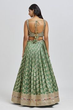 Mud green attached cancan lehenga with all over floral pattern and golden embroidered hem. Paired with a padded blouse with all over embroidery using beads, mirror, zari, sequin and cutdana work and dupatta. - Aza Fashions Green Sleeveless Traditional Wear For Wedding, Sleeveless Green Traditional Wear For Wedding, Sleeveless Green Traditional Wedding Wear, Sleeveless Green Pallu Traditional Wear, Green Sleeveless Traditional Wear With Pallu, Sleeveless Green Traditional Wear With Pallu, Green Sleeveless Embroidered Traditional Wear, Cancan Lehenga, Cutdana Work