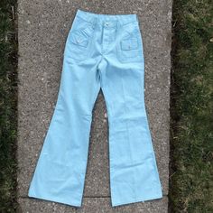 Vintage mint condition Maverick light blue bell bottom pants.  Snap button  Excellent vintage condition with no flaws found  Measurements taken laying flat  Waist 28  Hips 38  Rise 11  Inseam 34  Leg opening 12 Blue Cotton Wide Leg Flares, Blue Fitted Cotton Flares, Fitted Blue Cotton Flares, Retro Blue Straight Leg Flares, Retro Blue Cotton Flare Jeans, Retro Blue Flare Jeans With Pockets, Vintage High Waist Spring Flares, Vintage High Waist Flares For Spring, Retro Full-length Light Wash Flare Jeans