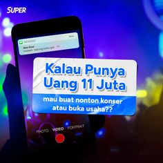 a person holding up a cell phone with the text kalau punya uang 11 juta on it