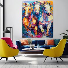 a living room with two chairs and a painting on the wall above it's couch