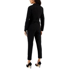 Step into the spotlight with the ultimate power outfit - the Belted Pantsuit from Tahari ASL. This impeccably tailored ensemble features a belted jacket with a sleek notch collar, wrap closure with snaps, and an asymmetrical hem for a modern touch. The coordinating pants boast a flattering mid-rise, straight fit, and convenient pockets for added functionality. Crafted from a luxurious blend of polyester and elastane, this pantsuit offers both style and comfort for all-day wear. The addition of s Elegant Workwear Blazer With Belt Loops, Fitted Belted Business Blazer, Fitted Blazer With Belt Loops For Work, Fitted Office Blazer With Belt Loops, Fitted Blazer With Notch Lapel And Belt Loops, Sleek Notch Lapel Pantsuit For Work, Belted Fitted Blazer For Business Casual, Fitted Blazer With Belted Cuffs For Office, Elegant Blazer With Belted Cuffs For Business Casual