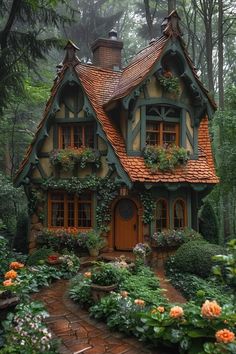 a small house in the woods with lots of flowers