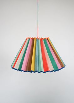 a multicolored lamp hanging from a ceiling