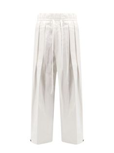 Wide leg trousers from Jil Sander provide a sustainable option for daily wear. Crafted from 100% organic cotton, these trousers prioritize both style and environmental responsibility. The elastic waistband includes a drawstring for added comfort, complemented by lateral welt pockets and button accents for practicality.

- 100% organic cotton
- Elastic waistband with drawstring
- Lateral welt pockets
- Button details Jil Sander Shoes, Pleats Please Issey Miyake, Top Designer Brands, High End Fashion, Jil Sander, Luxury Retail, Wide Leg Trousers, The List, Bottoms Pants