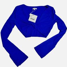 New With Tags In The Size Extra Small Blue Fitted Cropped Top, Fitted Cropped Blue Top, Royal Blue Fitted Tops, Blue Fitted Long Sleeve Crop Top, Chic Blue V-neck Crop Top, Blue Cropped Top For Fall, Fitted Long Sleeve Blue Crop Top, Blue Stretch V-neck Crop Top, Blue Stretch Crop Top For Fall