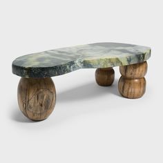 a bench made out of wood and marble