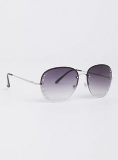 Pave rhinestones trim the sides of rimless aviator sunglasses for a feminine finish to boyish frames. Pave rhinestone side. Adjustable nose pads. 100% UV protection. Man-made materials. Imported. The best plus size women's rhinestone rimless aviator sunglasses eyewear in silver. Silver Rimless Aviator Sunglasses With Uv Protection, Silver Rimless Sunglasses For Party, Silver Sunglasses With Rhinestones, Silver Rhinestone Sunglasses With Glass Lenses, Silver Rhinestone Sunglasses With Glass, Trendy Silver Sunglasses With Rhinestones, Rhinestone Trim, Aviator Sunglasses, Eyewear Sunglasses