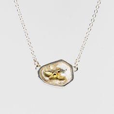 $332 - $440 depending on combination Handcrafted in Seattle *MADE TO ORDER - requires 4-5 weeks Materials: solid sterling silver solid 14k yellow gold diamonds Measurements: Adjustable necklace length: 17” - 19” Pendant size: .75” x .5” x .25” Diamonds: 2mm (.03 carat) Features: Versatile: Necklace is reversible - wear whichever side facing the world that gives you the most confidence that day. Adjustable necklace length accommodates varying necklines and tops High Quality - all connections are Gold And Diamond Necklace, Hidden Talents, Rock Necklace, Fancy Necklace, Everyday Necklace, Inner Beauty, Adjustable Necklace, That Day, Gold Flowers