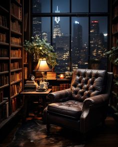 a leather chair sitting in front of a book shelf filled with books and a lamp