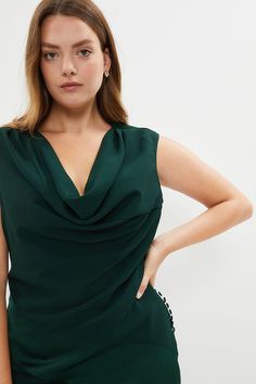 A decidedly dramatic choice for your next black-tie ball, this sweeping satin maxi dress showcases a draped cowl neckline, neat row of fabric-covered buttons and sultry diagonal panel in a sumptuous fabric. Fitted with a seductively high hem split, it adds instant drama to special occasions.Expertly designed for those size 18 and above, our plus size collection is perfectly proportioned to ensure you look stylish at every shape.Style: Fit & Flare DressDesign: PlainFabric: SatinLength: MaxiNeckline: CowlSleeve Length: Sleeveless Dresses Plus Size, Cowl Neckline, Satin Maxi, Satin Maxi Dress, Fabric Covered Button, Maxi Dress Green, Look Stylish, Fabric Covered, Covered Buttons