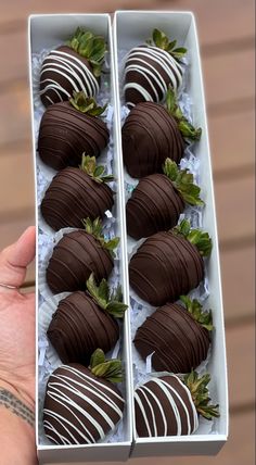 there are chocolate covered strawberries in the box