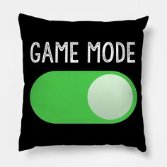 a black and green pillow with the words game mode on it