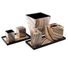 marble bathroom accessories set with soap dispenser and toothbrush holder on black tray