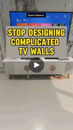 a tv sitting on top of a white counter next to a wall with the words stop designing complicated tv walls