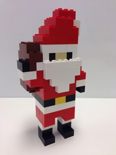 a lego figure made to look like santa clause