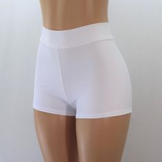 "High Quality Matte White Spandex Shorts High Waist 2\" Waistband STYLE OPTIONS Regular Length: PICTURED Cheeky: NOT PICTURED SIZING INFO ⭐Sizing Chart in Photos⭐ If you need help with sizing, send me a message and please include the following measurements: ✅NATURAL WAIST ✅HIPSTER WAIST ✅HIPS ✅Thigh ⭐Inquire within for Adult 6X and up. CUSTOM REQUESTS 👉Need the waist higher/lower? 👉Inseam longer/shorter? 👉Love this style but not the fabric or color? 👉Love this fabric and color but not this s White Workout Shorts, White Mini Shorts, White Compression Activewear With Built-in Shorts, White Compression Biker Shorts With Built-in Shorts, Summer Biker Shorts For Cheerleading, White Boxer Briefs With Built-in Shorts For Sports, White Compression Shorts For Summer, White Boxer Briefs With Built-in Shorts For Gym, Summer Cheerleading Stretch Biker Shorts