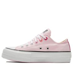 Looking for a cute and stylish way to celebrate Valentine's Day? Check out the Converse Women's WMNS Chuck Taylor All Star Lift Ox 'Valentine'! This festive sneaker features a pink canvas upper with black details for a fun and festive look. The platform midsole provides a lift, while the magenta flowers add a whimsical touch. Whether you're spending the day with your special someone or going out with friends, the Converse Women's WMNS Chuck Taylor All Star Lift Ox 'Valentine' is the perfect way Converse Womens, White Canvas Shoes, Magenta Flowers, Chuck Taylor All Star Lift, Converse Chuck Taylor All Star, Womens Converse, Chuck Taylor Sneakers, White Canvas, Chuck Taylor All Star