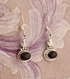 "#Mother's Day gift items925 Sterling Silver Black Onyx Oval Shape Gemstone Earrings. Gemstone Name: Natural Black Onyx Metal: 925 Sterling Silver Earring Size:- Length: 3.5 cm approx Width: 1 cm approx Quantity: 1 Pair click more red garnet earrings:- https://www.etsy.com/your/shops/Shreejaipursilver925/tools/listings/query:black%20onyx%20earrings,state:draft,sort:update_date,stats:true This gemstone eliminates negative thinking and is believed to sharpen the wits of the wearer.\" Black onyx he Red Garnet Earrings, Black Onyx Earrings, Silver Rings Simple, Birthstone Earrings, Gemstone Stud Earrings, Garnet Earrings, 925 Silver Earrings, Birthstone Earring, Silver Engagement Rings