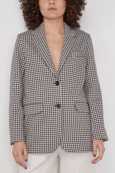 The Rosetta Getty Gingham Tailored Blazer is a piece you'll have for years to come. This blazer features a tailored silhouette with a classic single button closure in gingham. Wear yours with the matching trousers and heels. FIT DESCRIPTION Fits true to size, take your normal size Blazer Tailored silhouette Single button closure Notched lapel 80% viscose, 14% polyamide, 6% elastane Taylor is wearing a size S MODEL MEASUREMENTS Bust: 33.5" Waist: 27.5" Hips: 36.5" Height: 5’9” Spring Gingham Blazer For Workwear, Spring Plaid Blazer With Welt Pockets, Fall Gingham Blazer For Work, Fall Gingham Blazer For Workwear, Fall Workwear Gingham Blazer, Classic Gingham Blazer For Work, Rosetta Getty, Tailored Blazer, White Jacket