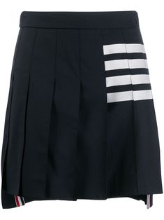 Introducing...your new uniform. This pleated Thom Browne skirt puts a grown-up twist on preppy style. Round of applause for the star of the show. Featuring a high waist, a side buckle fastening, a pleated design, a high low hem, a short length, a signature grosgrain loop tab and a 4-Bar stripe. | Thom Browne 4-Bar pleated miniskirt Pleated Miniskirt, High School Uniform, Round Of Applause, Performance Outfits, Work Clothes, Blue Skirt, Pleated Mini Skirt, Skirt Design, Grown Up