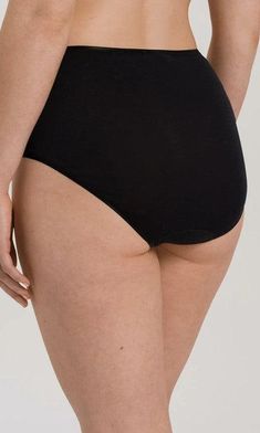 Hanro Cotton Seamless Maxi Brief in Black from the best selling Cotton Seamless range. Super soft feel for ultimate comfort in 100% Mercerised cotton The seamless Hanro maxi brief offers a fuller coverage for added comfort, with the signature seamless sides for a flattering and sleek profile beneath your clingy garments. An elasticated satin trim adds a modern and feminine touch, plus a comfortable and custom fit and black is great under jeans or darker trousers. Product Code 071625 Cotton Seamless Full Coverage Bottoms, Black Seamless Brief Bottoms, Seamless Cotton Bottoms, Solid Seamless Cotton Bottoms, Solid Cotton Bottoms With Seamless Construction, Black Bottoms With Comfort Stretch And Soft Touch, Black Micro-elastic Soft Touch Shapewear, Black Soft Touch Brief Shapewear, Black Bottoms With Light Support