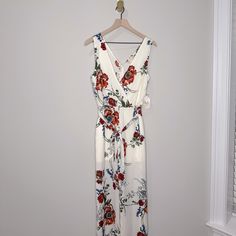 Nwt Altar’d State Floral Jumpsuit Size M, True To Size White Tie Waist Jumpsuits And Rompers For Vacation, White Floral Print Jumpsuits And Rompers For Vacation, White Floral Print Jumpsuit For Vacation, White V-neck Jumpsuit With Tie Waist, White Fitted Jumpsuits And Rompers With Tie Waist, Fitted White Jumpsuits And Rompers With Tie Waist, White Fitted Jumpsuit With Tie Waist, Altard State, Floral Jumpsuit