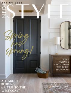 a magazine cover with a black door and mirror on the wall in front of it